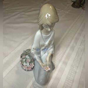 Iladro Girl Kneeling Next to Flower Basket